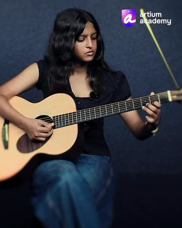 Learner plays Señorita on guitar